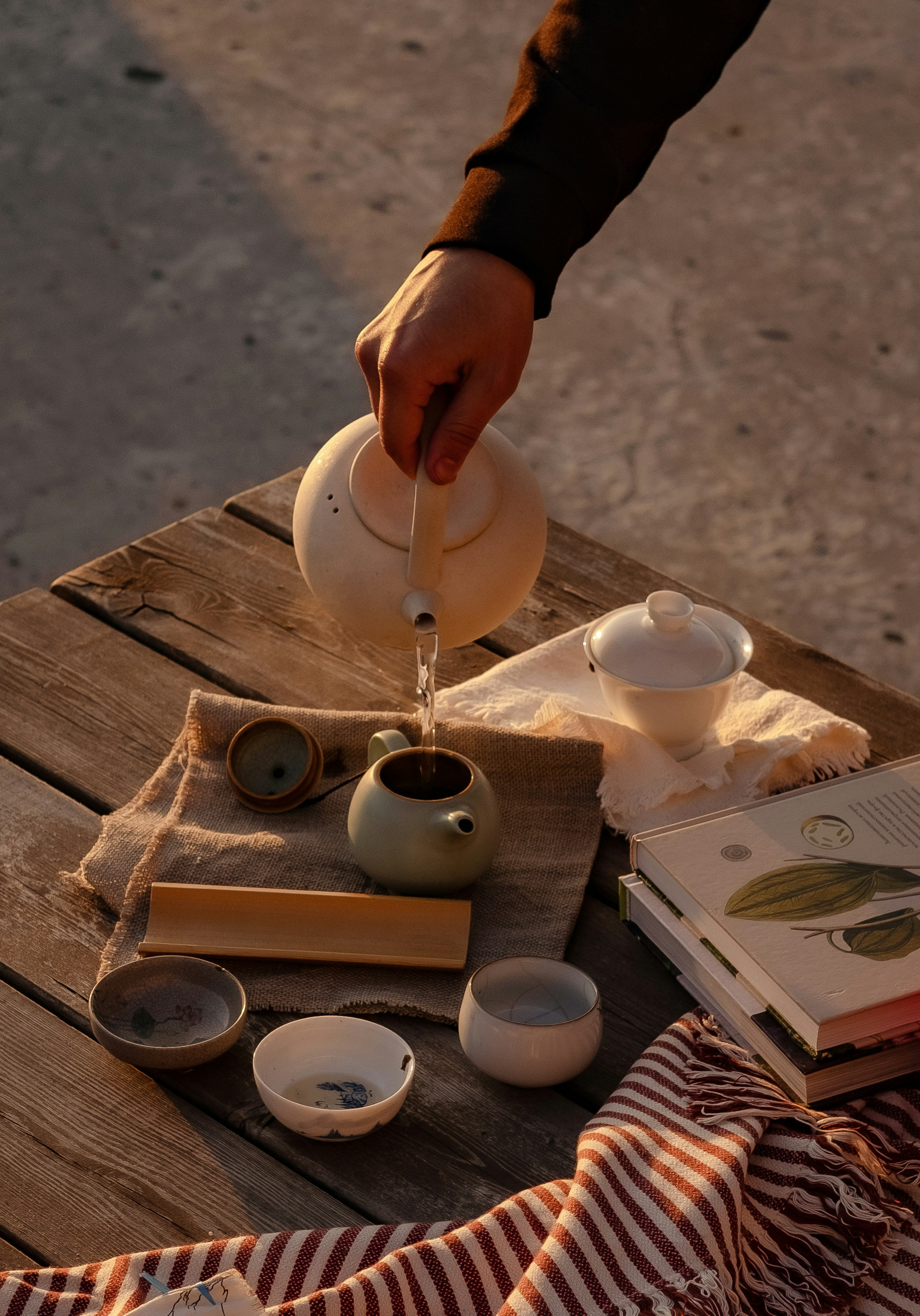 Pouring tea into a cup